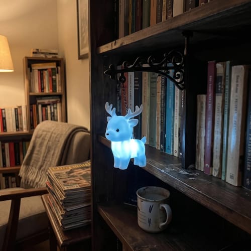 ✨📖Enchanted Hanging Animal Bookshelf Light – Glowing Book Nook Decor for Readers